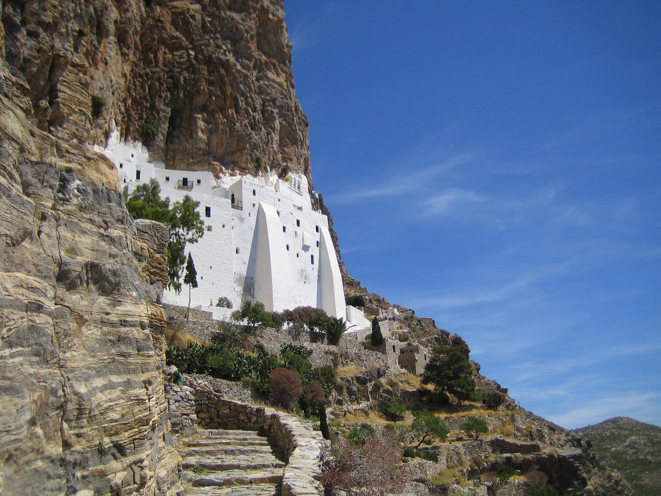 Monastery of Panagia Hozoviotissa perched on a steep cliff above the Aegean Sea
