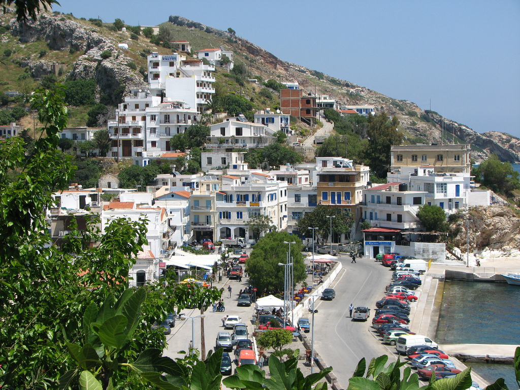 Agios Kirikos, the capital of Ikaria, with traditional houses cascading toward the Aegean