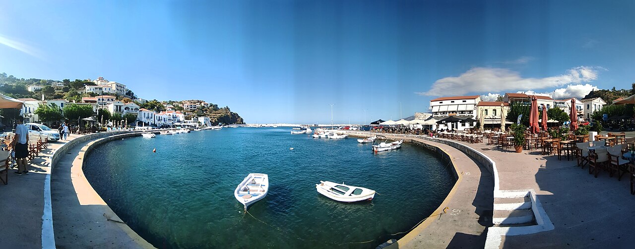 The port of Evdilos, Ikaria, with traditional buildings and fishing boats