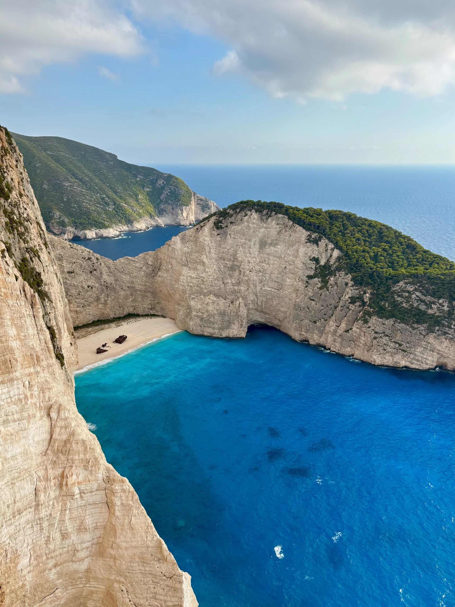 Navagio Shipwreck Beach in Zakynthos with dramatic limestone cliffs and turquoise water