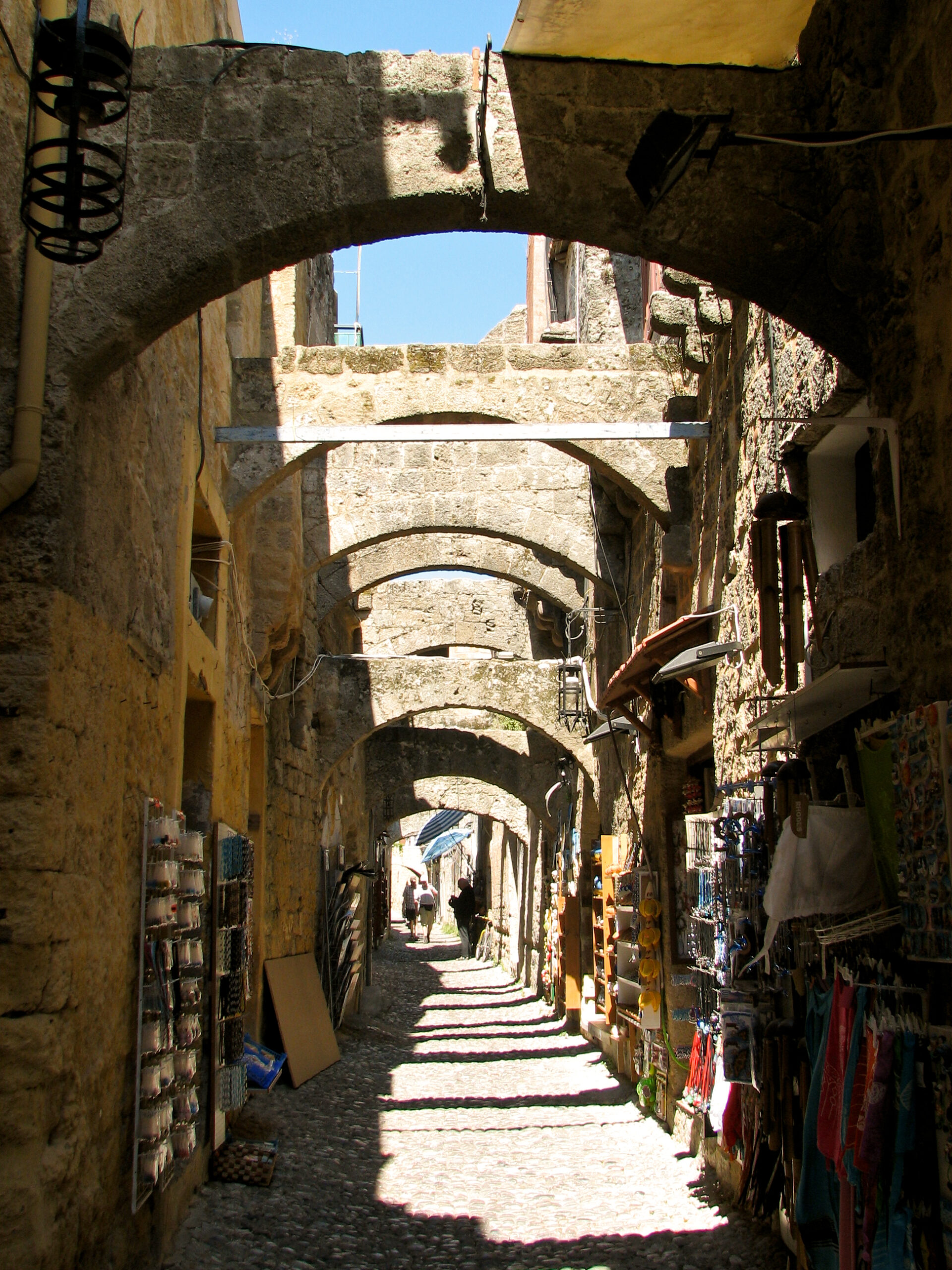 Family exploring the medieval streets of Rhodes Old Town