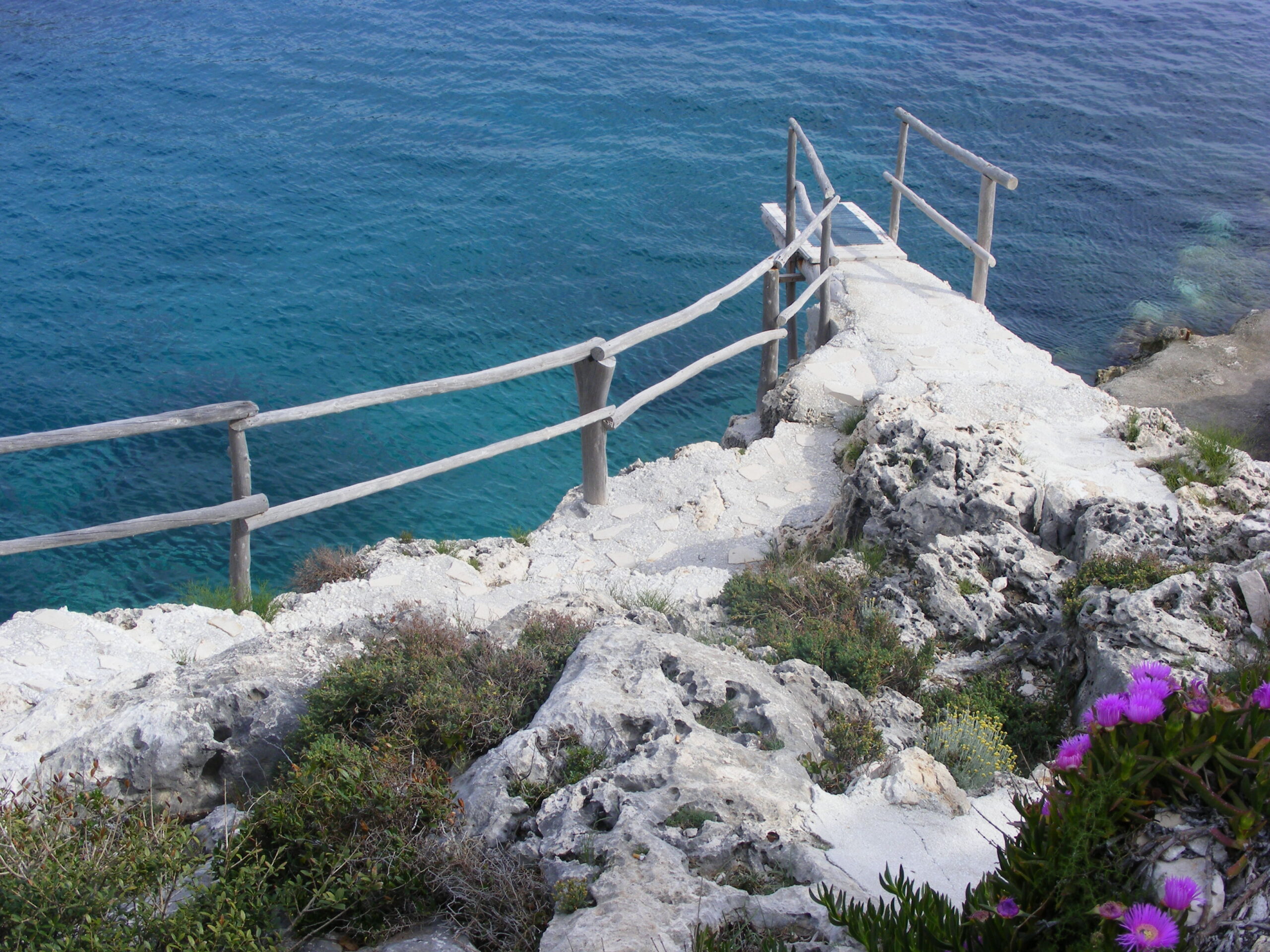 Natural limestone pools and rocky coastline at Porto Roxa, Zakynthos, Greece