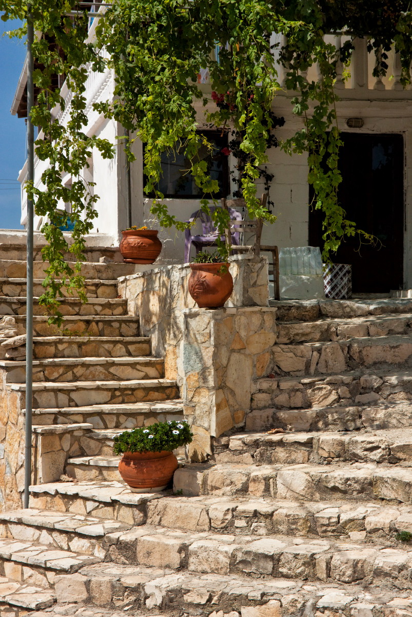 Traditional Volimes mountain village with stone buildings and green hillside, Zakynthos, Ionian Islands, Greece