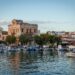 Aegina harbor marina with boats and neoclassical waterfront buildings, Saronic Islands Greece