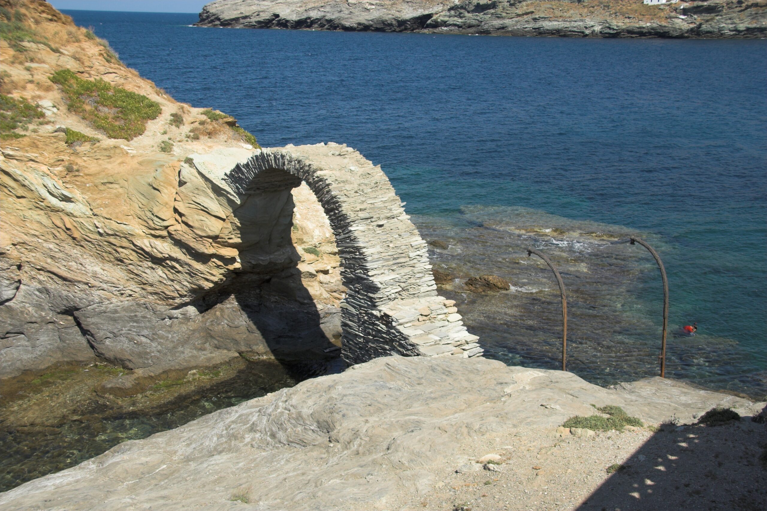 The stone bridge leading to the Venetian castle in Andros Chora