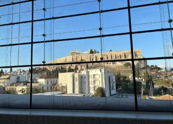 The Acropolis Museum in Athens with the Acropolis visible behind it