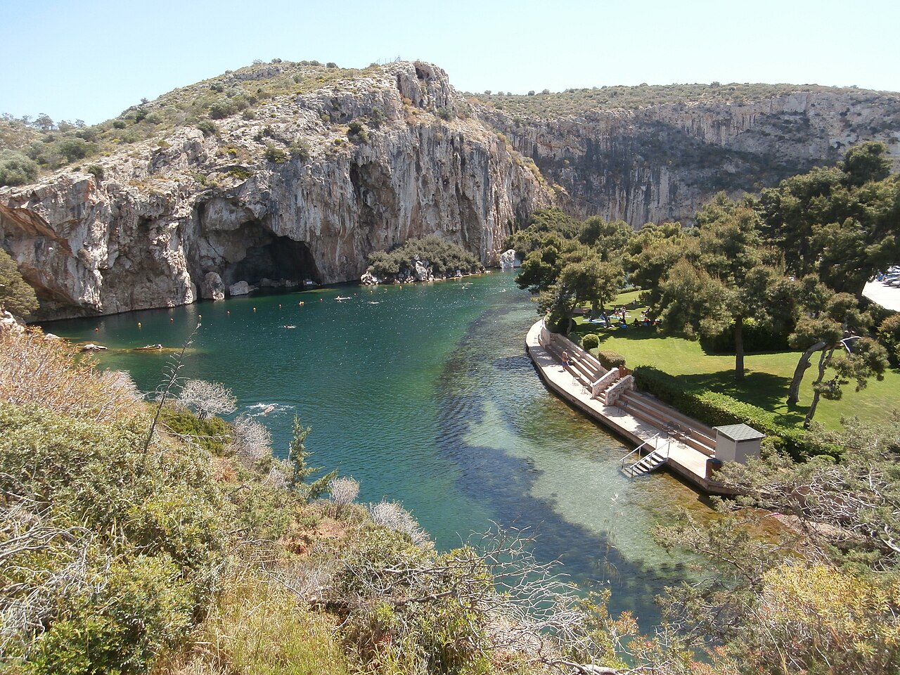 Lake Vouliagmeni surrounded by limestone cliffs