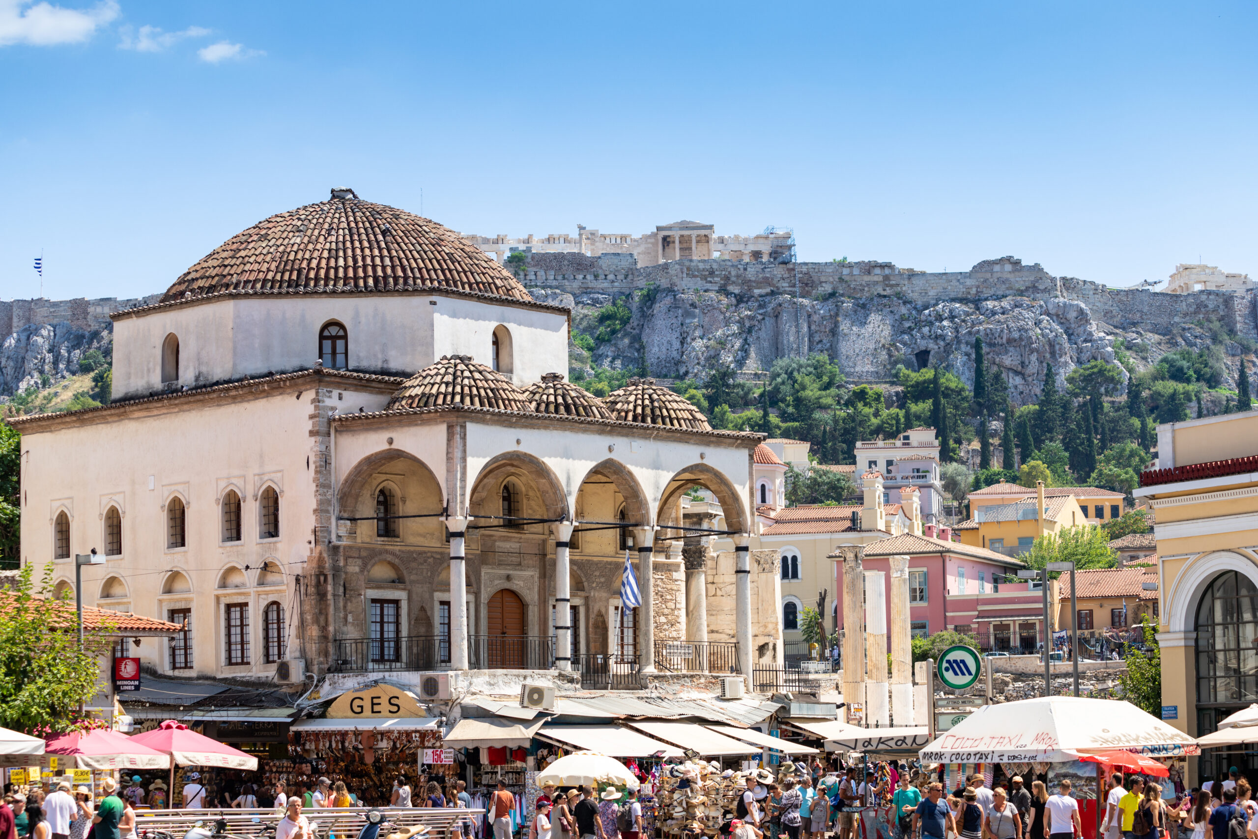 Monastiraki Square in Athens with the Acropolis visible behind the metro station
