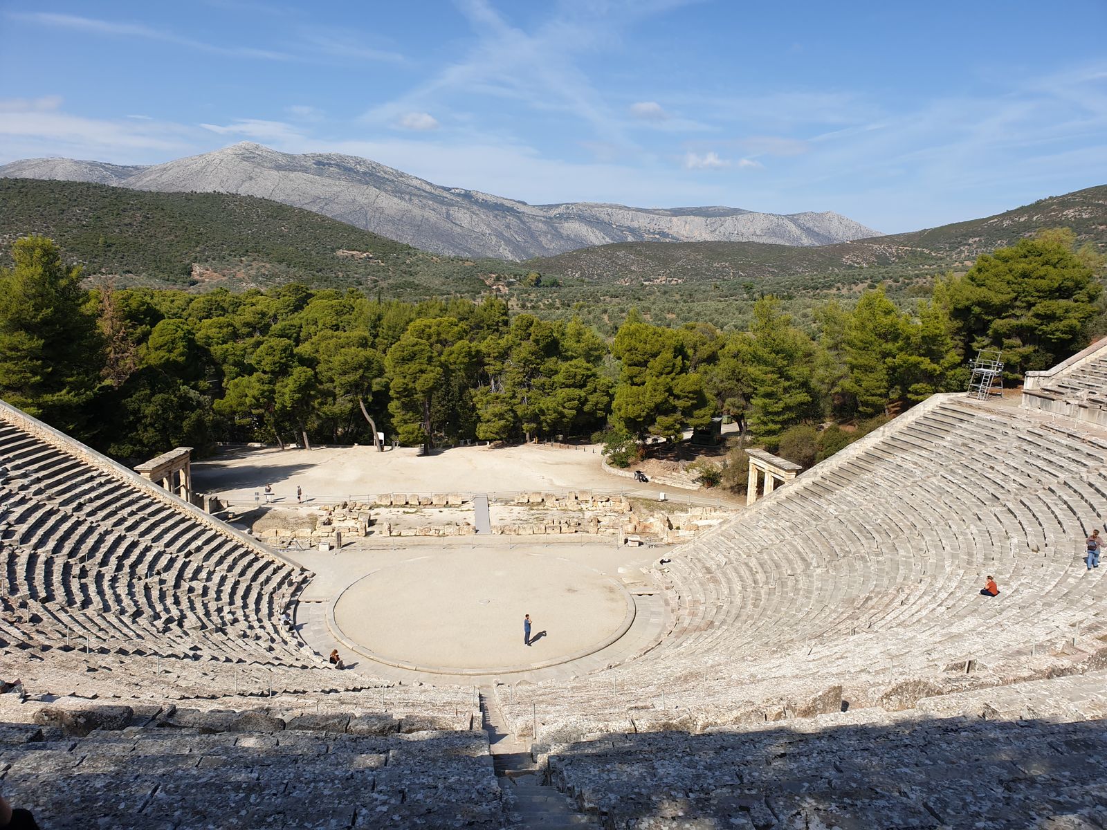 Ancient Theatre of Epidaurus surrounded by green hills in the Peloponnese, Greece