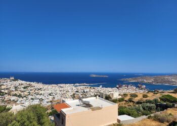 Aerial view of Ermoupoli harbour and the twin hills of Syros, Cyclades, Greece