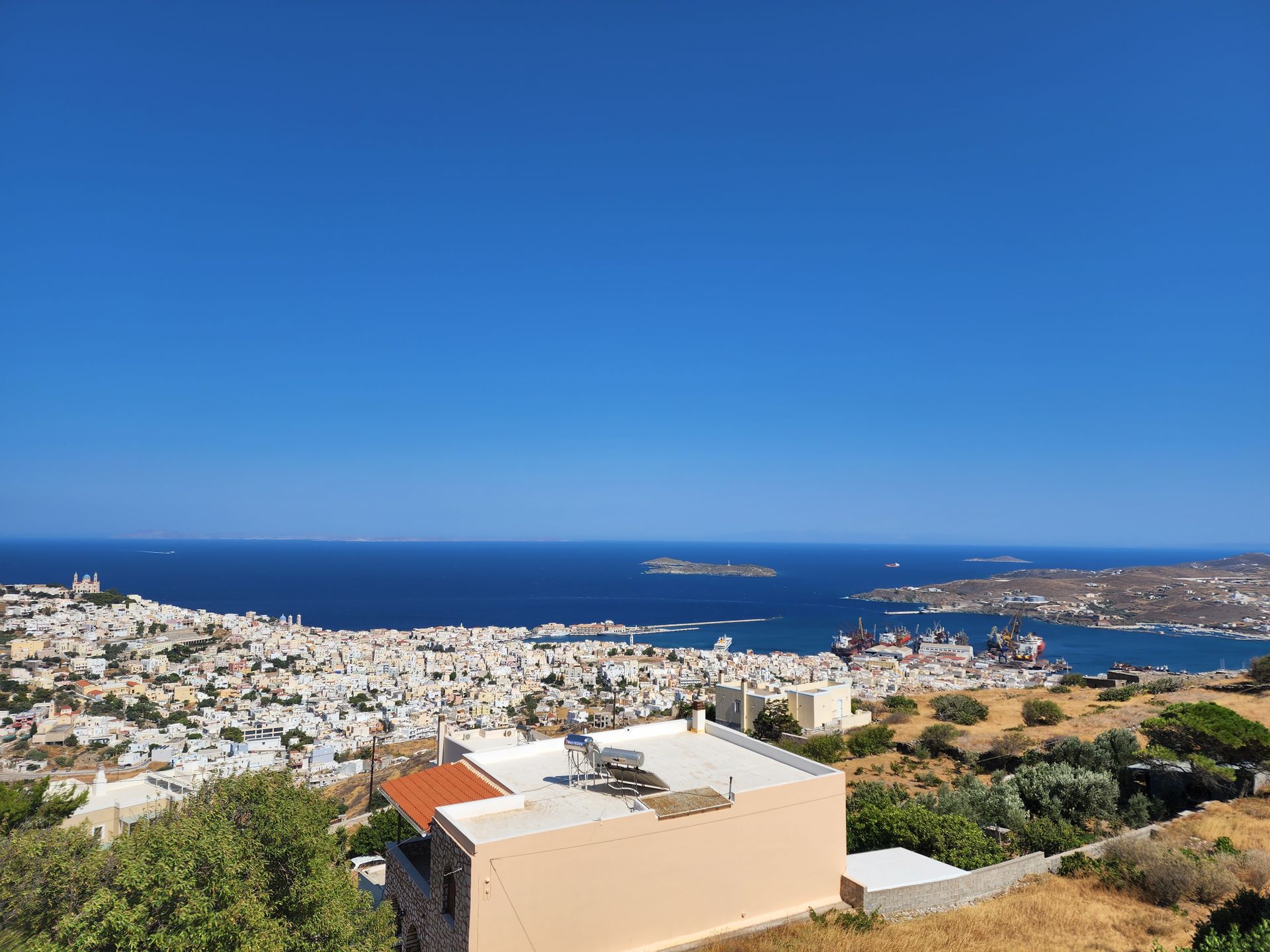 Aerial view of Ermoupoli harbour and the twin hills of Syros, Cyclades, Greece