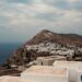Whitewashed village of Chora perched on a cliff edge above the Aegean Sea on Folegandros island