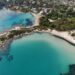 Aerial view of Sithonia coastline in Halkidiki with turquoise water and green hills