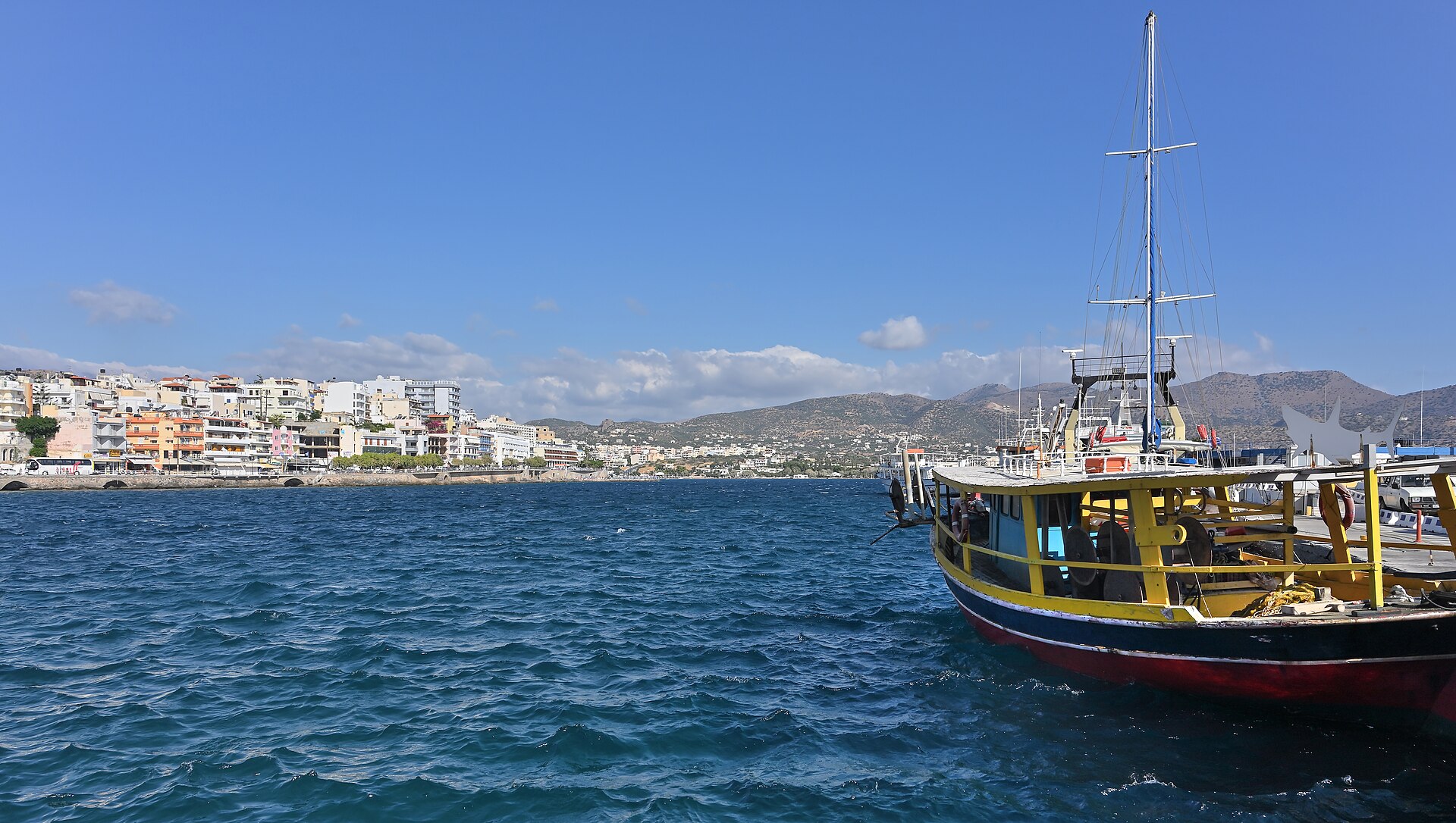 Harbour and waterfront buildings in Agios Nikolaos, Crete.