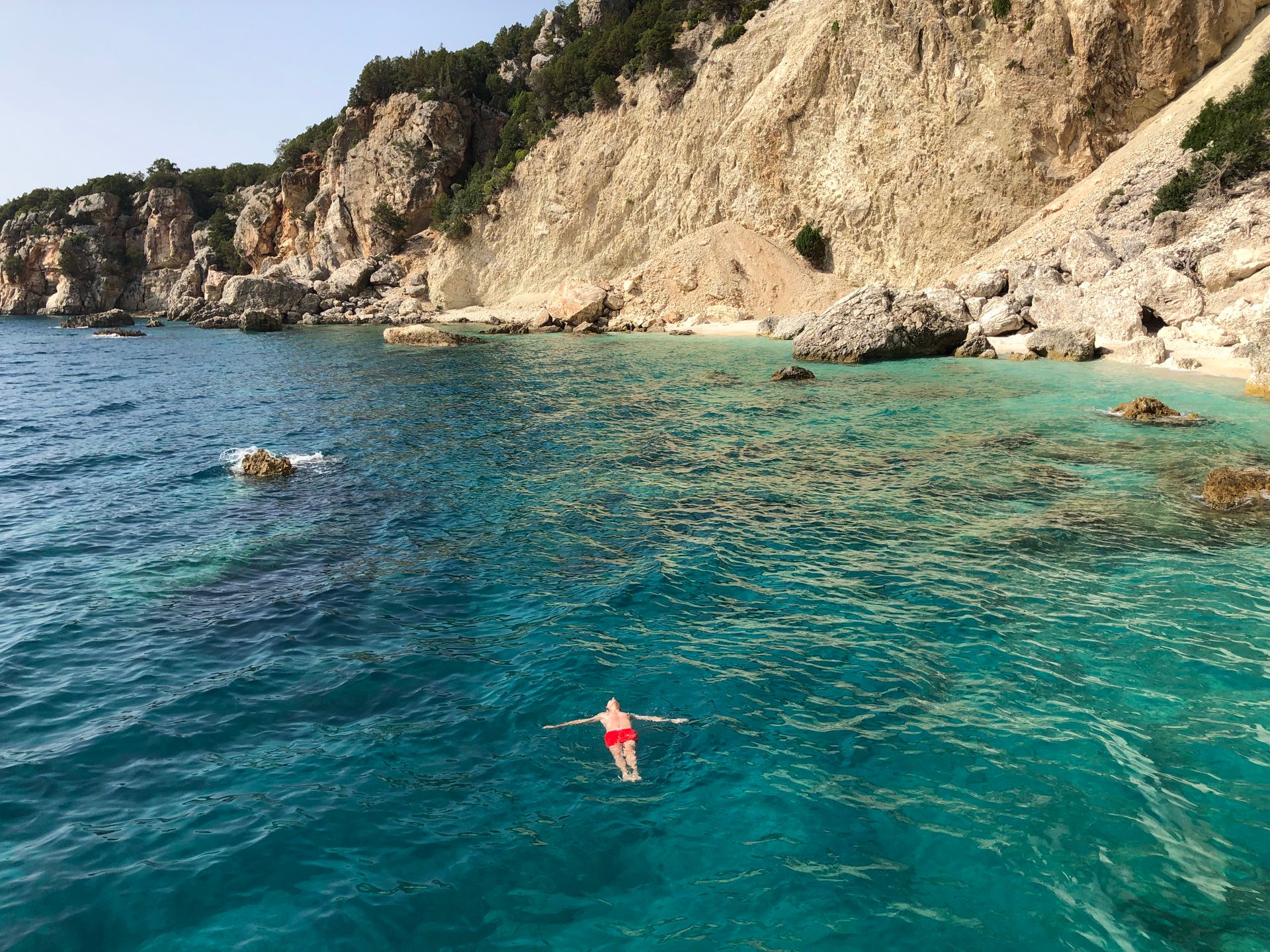 Crystal-clear turquoise waters off the coast of Ithaca island in the Ionian Sea Greece