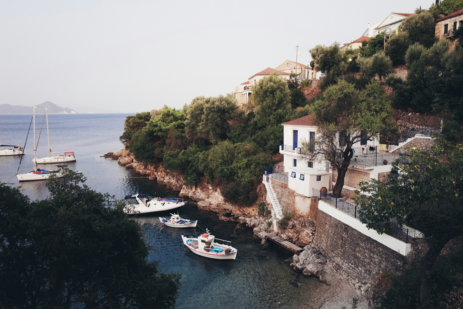 Kioni harbour on Ithaca island Greece with fishing boats and traditional houses