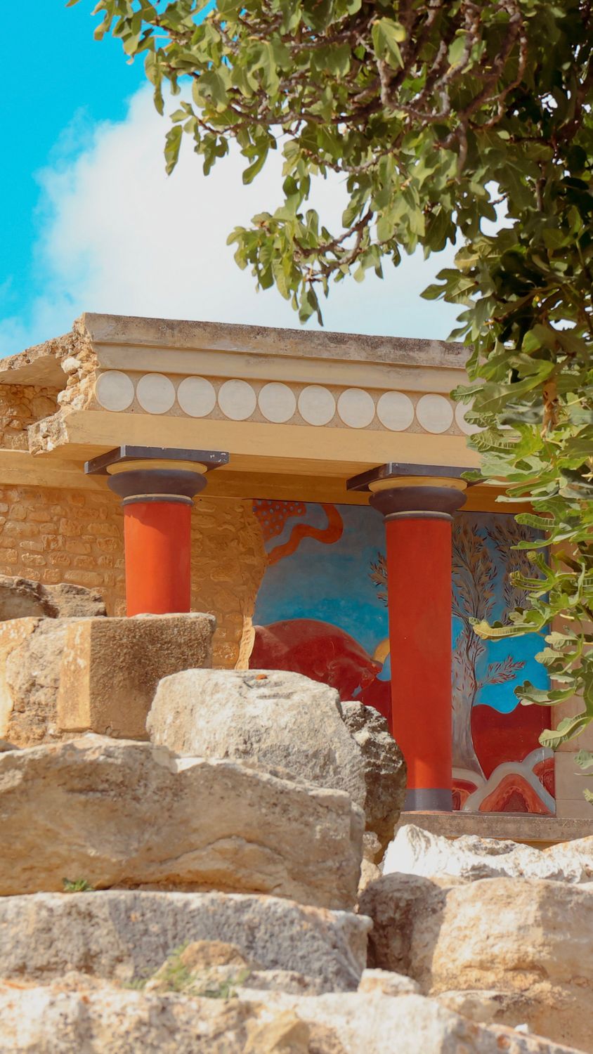 Restored red columns at the Palace of Knossos the largest Minoan archaeological site on Crete
