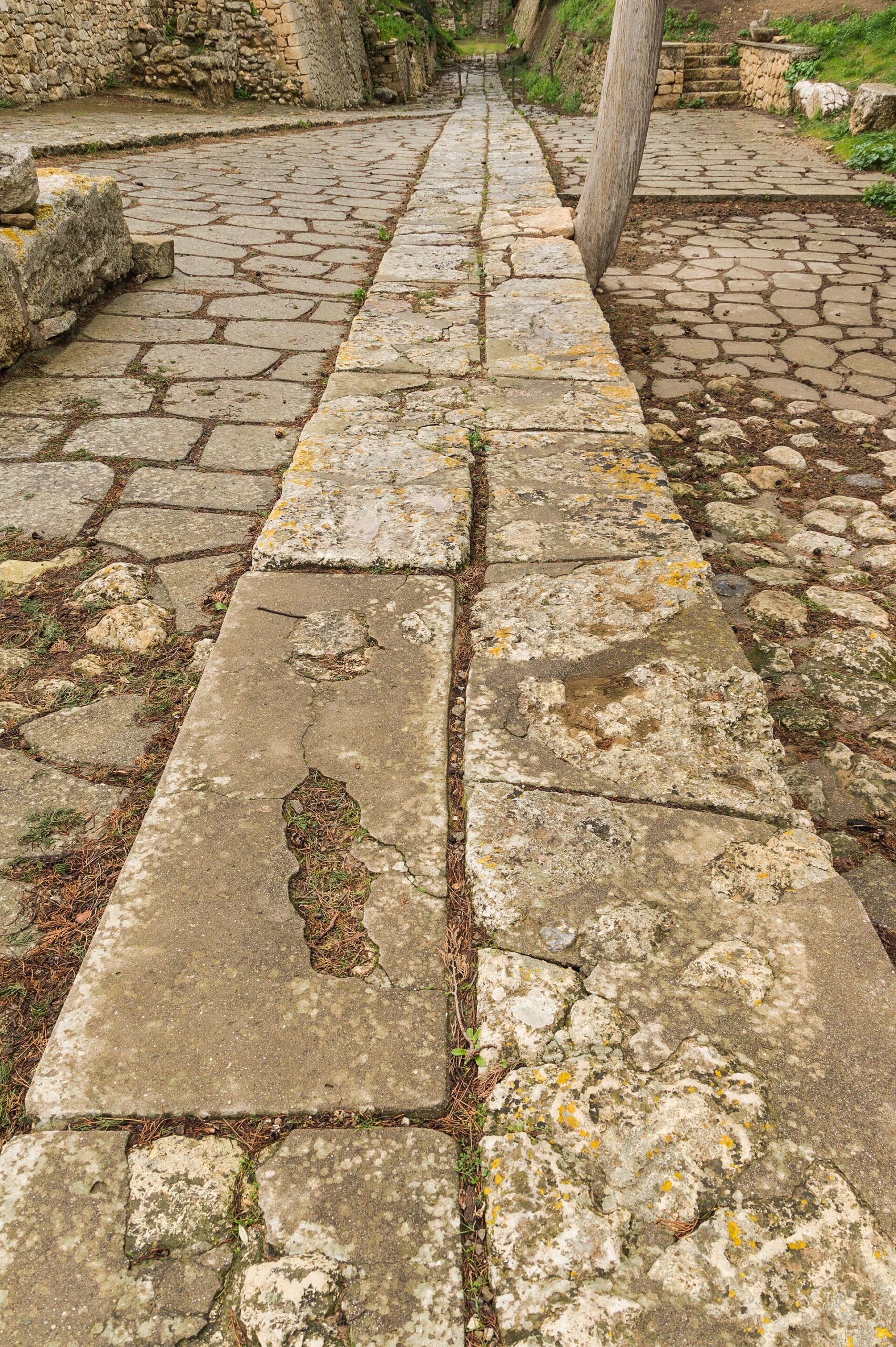 Stone-paved Royal Road within the archaeological site of Knossos in Crete.