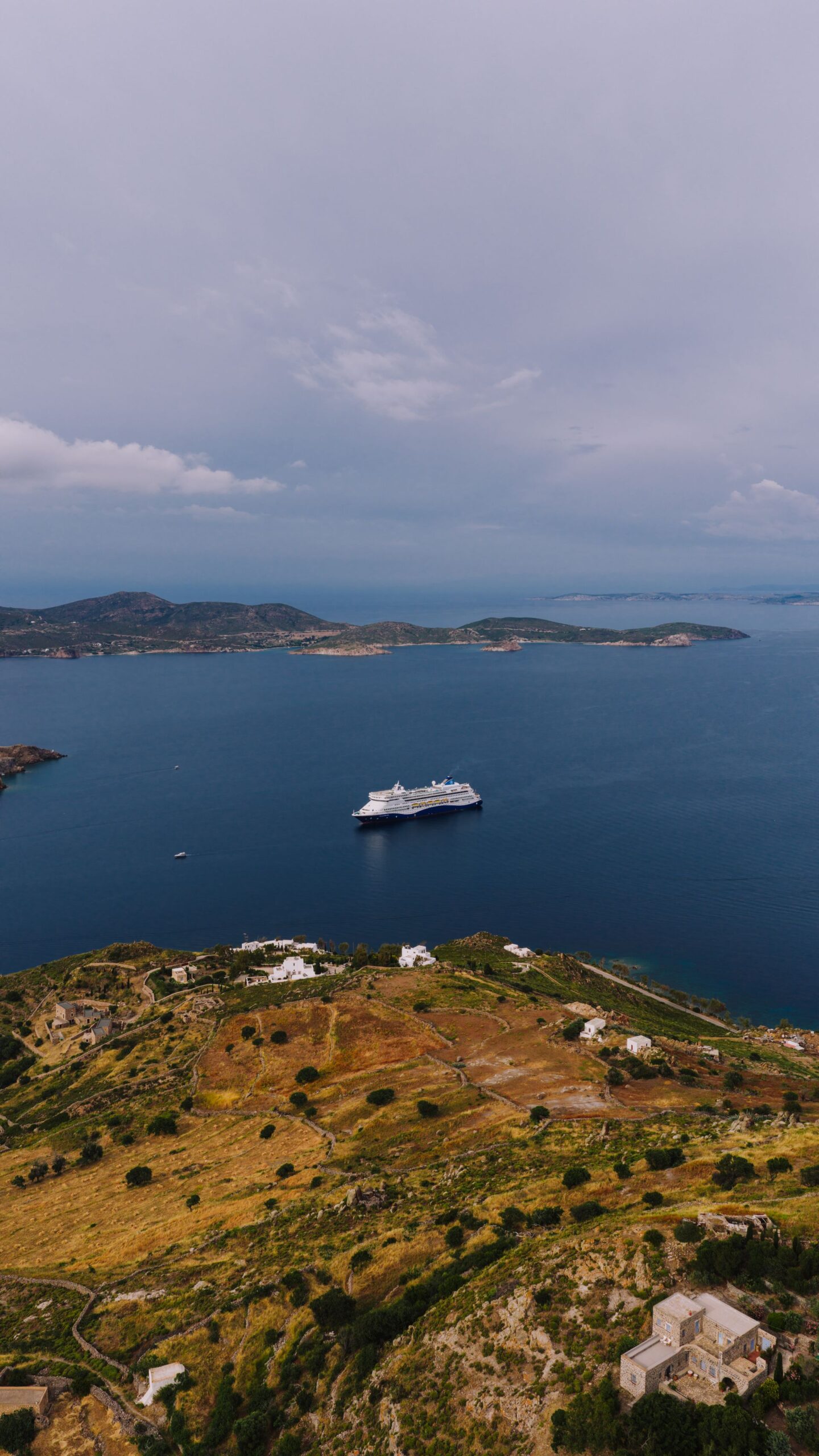 Coastline of Leros island with deep blue Aegean waters and rocky shores in summer