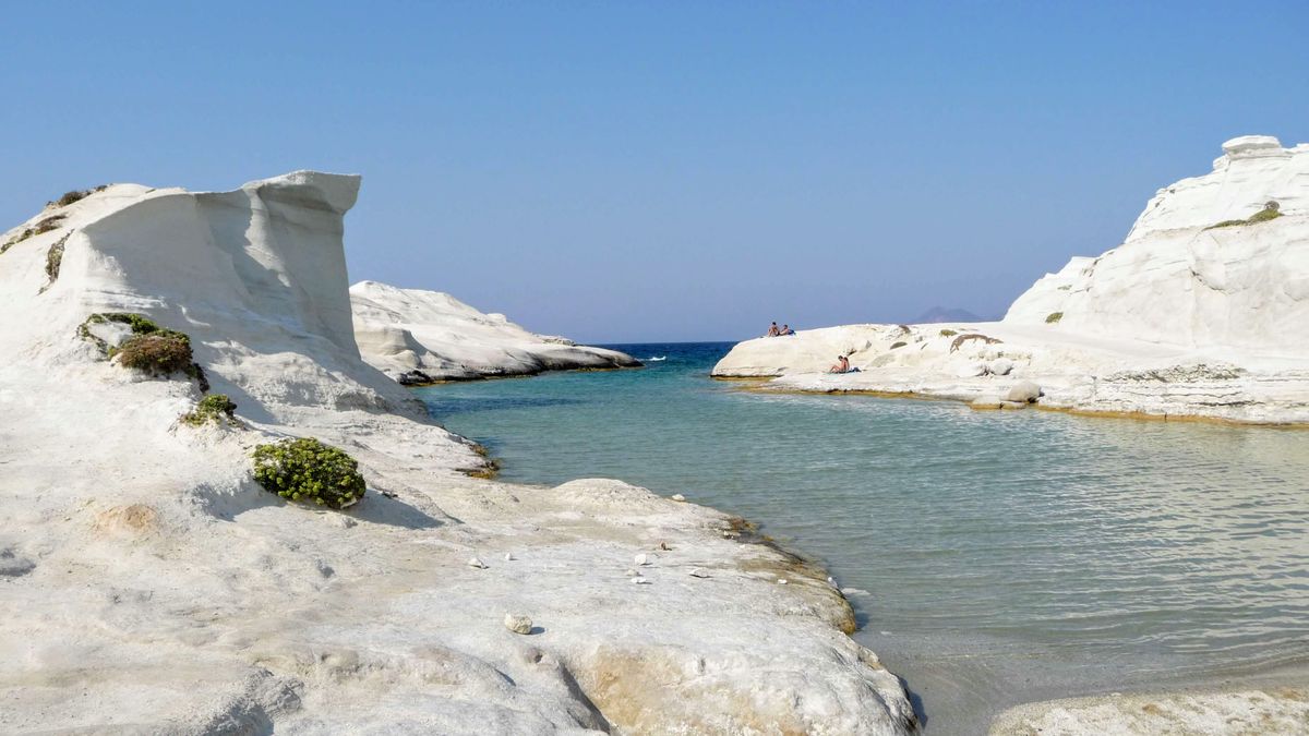 White volcanic rock formations and turquoise sea at Sarakiniko Beach on the north coast of Milos, Greece