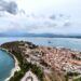 Aerial view of Nafplio from Palamidi Fortress showing the old town, Acronafplia peninsula, and the Argolic Gulf