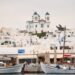 The old fishing port of Naoussa in Paros with traditional boats and waterfront buildings