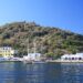 Harbour of Mandraki on Nisyros with white houses around the bay