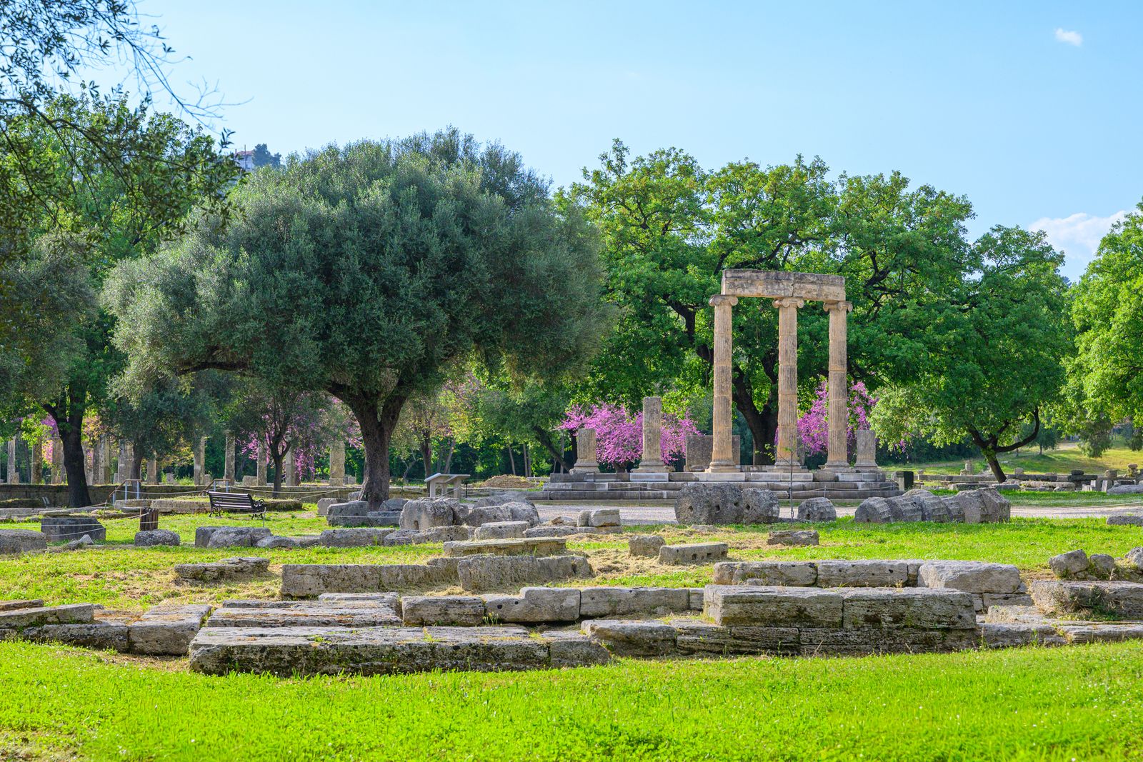 Ancient temple ruins and columns at the archaeological site of Olympia in the western Peloponnese, Greece