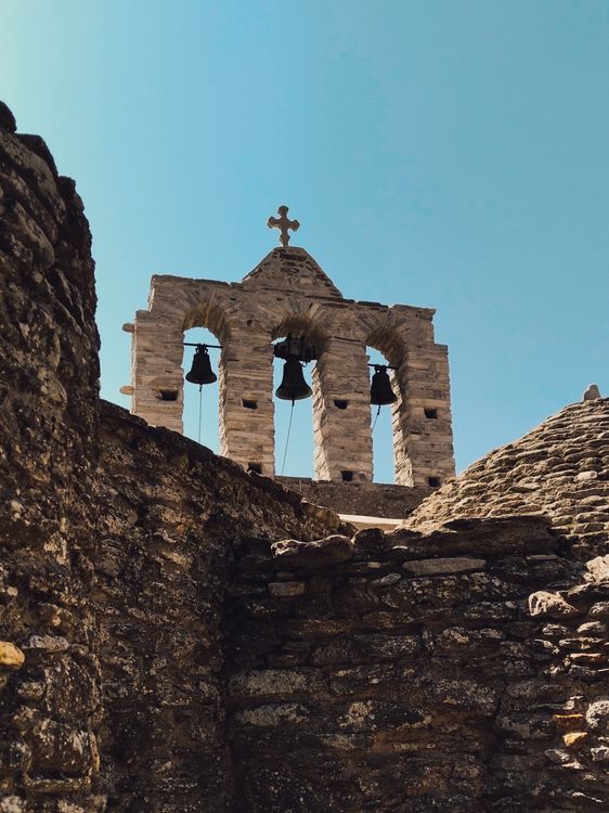 Ancient stone bell towers of Panagia Drossiani monastery near Halki in Naxos