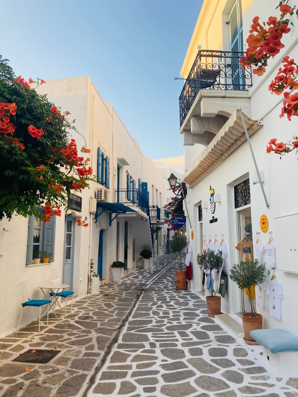 A narrow flower-lined street in the old town of Parikia, Paros