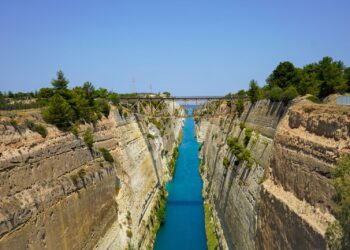 Aerial view of the Corinth Canal cutting through rocky cliffs in the Peloponnese, Greece