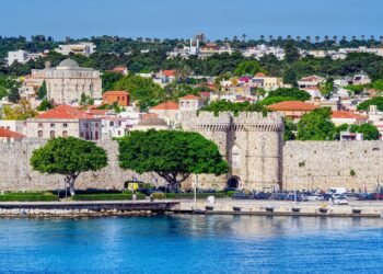 Medieval fortress walls and harbour of Rhodes Old Town on the Aegean coast