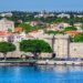 Medieval fortress walls and harbour of Rhodes Old Town on the Aegean coast