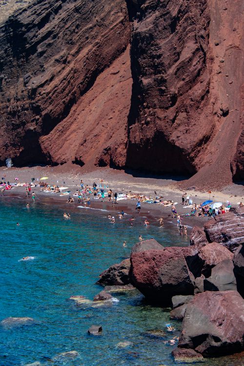 Red volcanic cliffs and beach at Red Beach near Akrotiri in southern Santorini