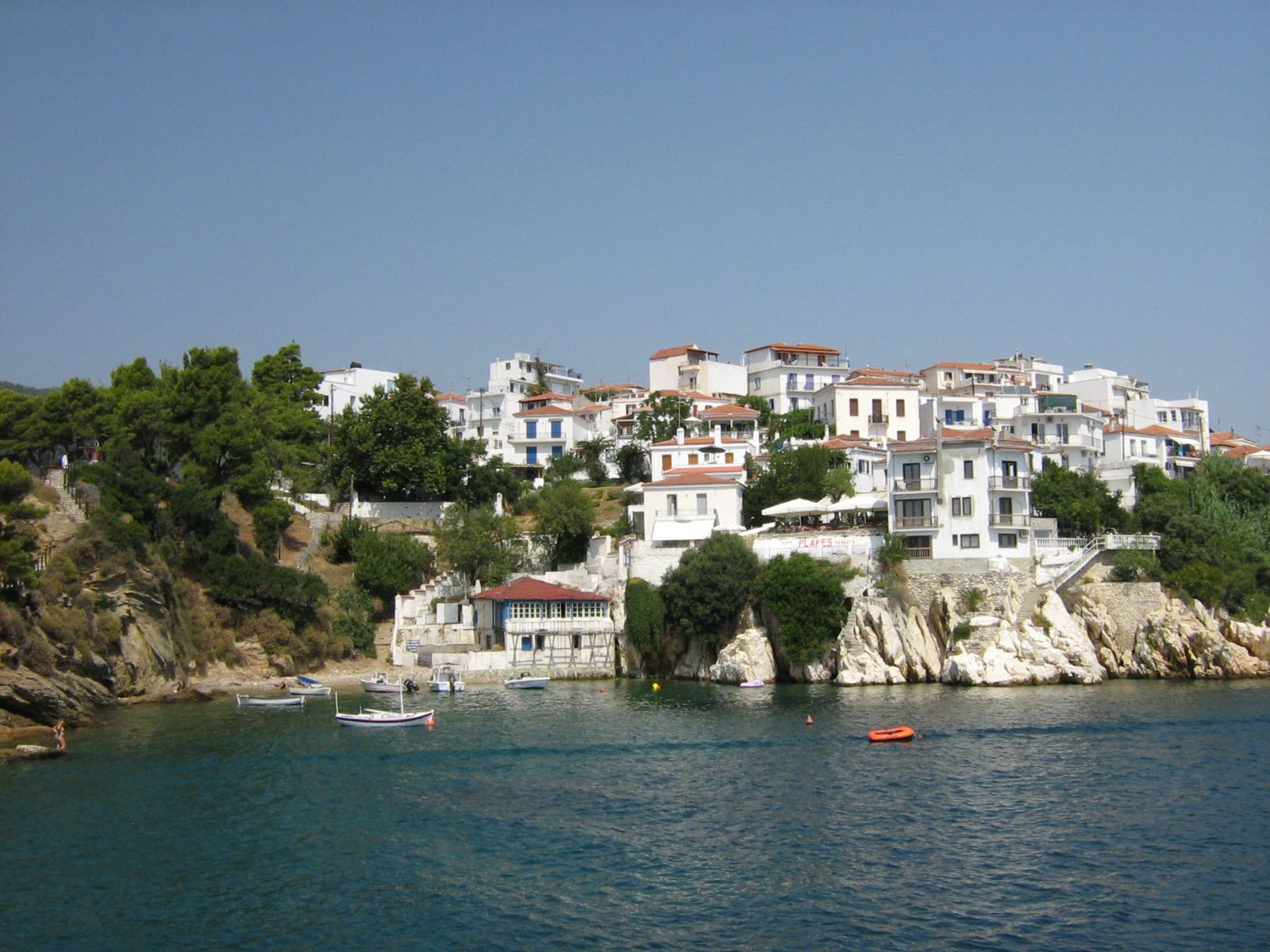 Traditional stone and tile-roof architecture along the Skiathos waterfront