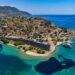 Aerial view of Spinalonga island fortress surrounded by blue sea near Elounda, eastern Crete