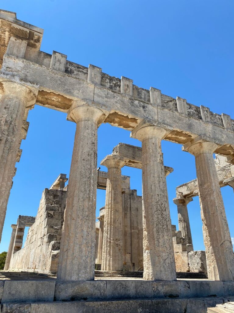 Temple of Aphaia ancient Doric columns on Aegina island under a clear blue sky