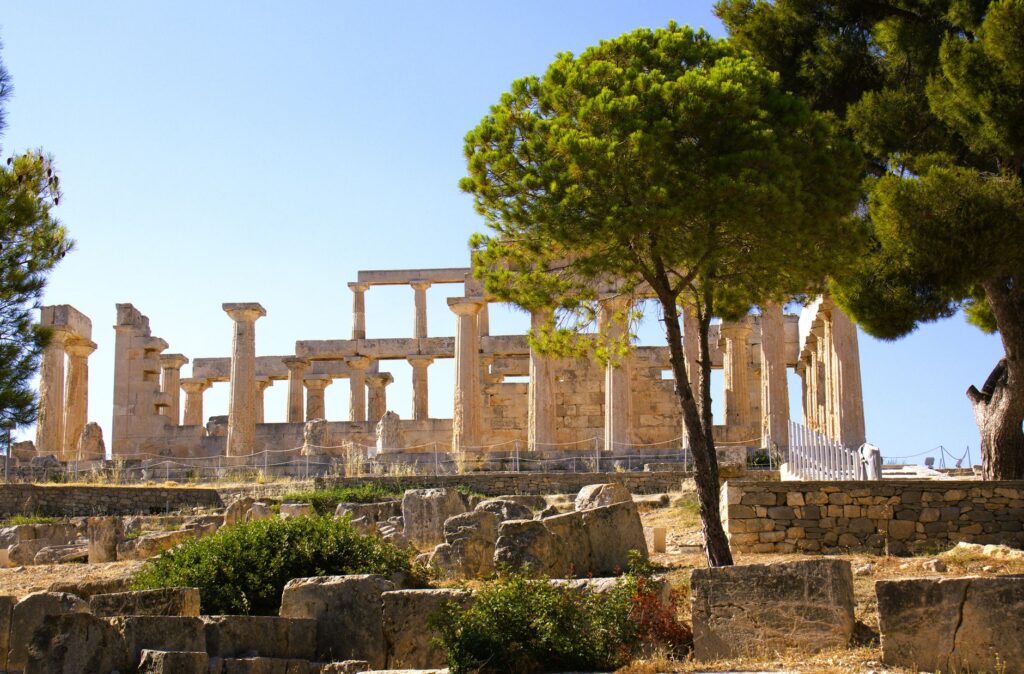 Ruins of the ancient Temple of Aphaea in Aegina, Greece on a sunny day