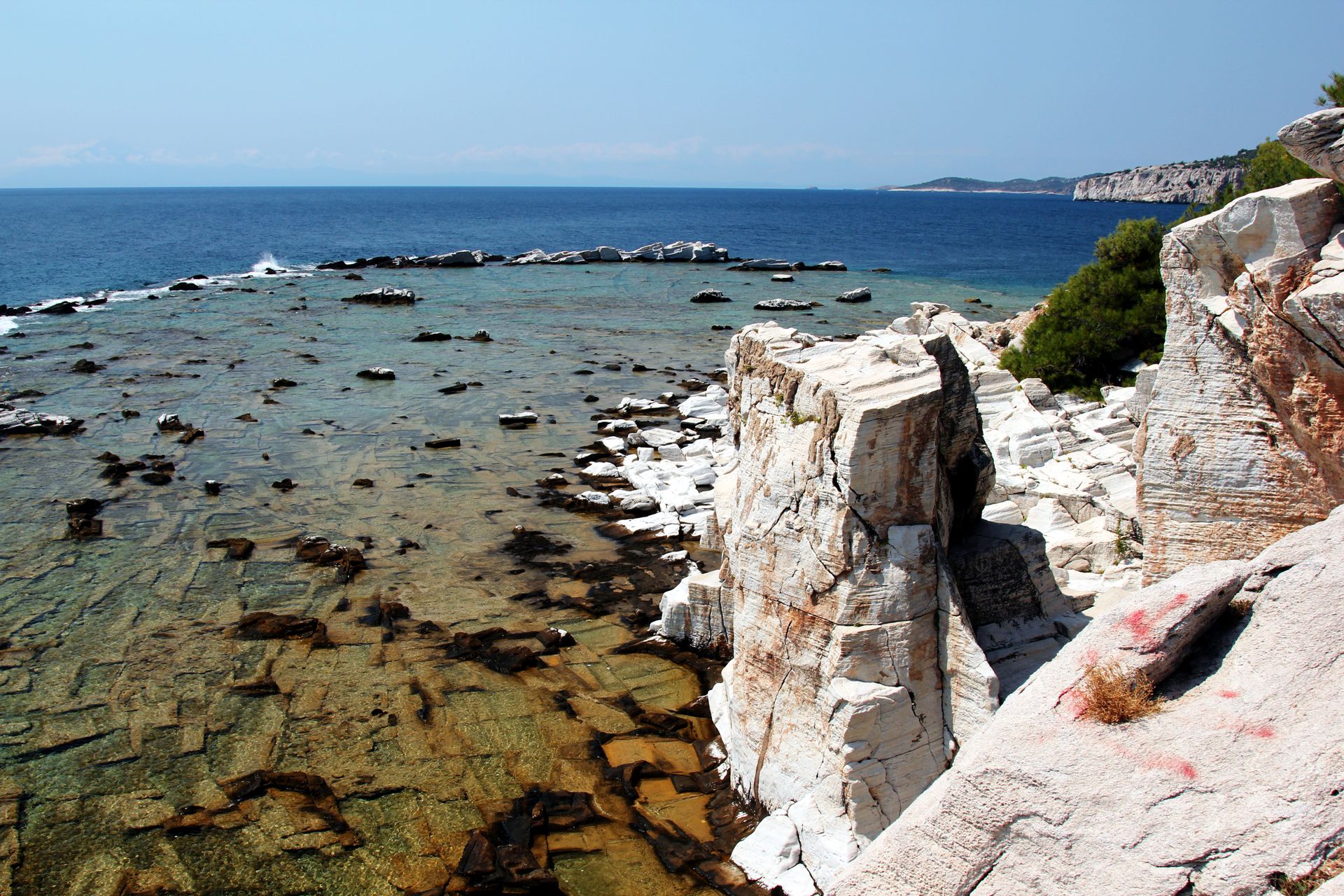 Aliki Beach Thasos with rocky formations and clear turquoise waters near the ancient marble quarry