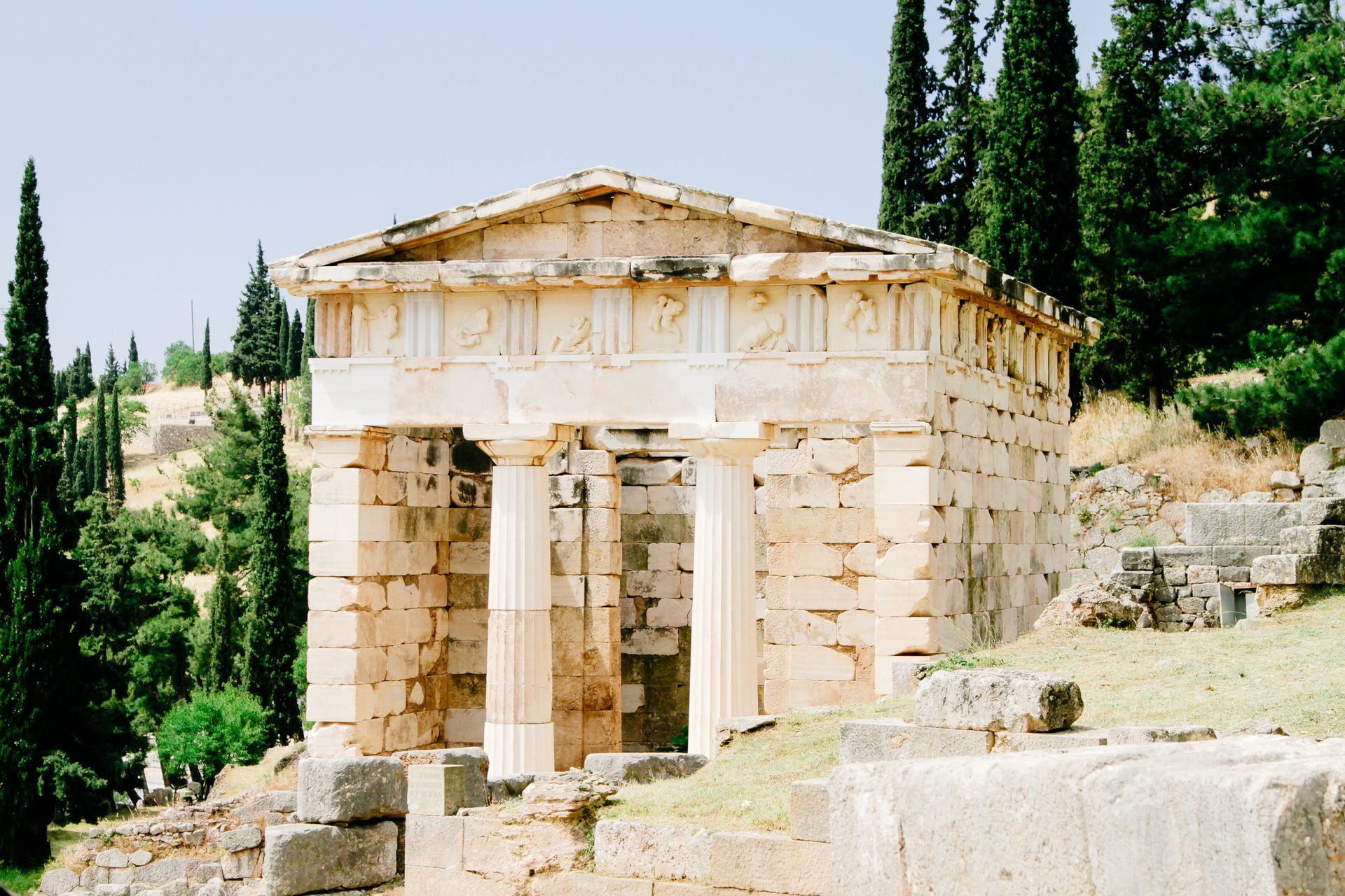 The reconstructed Treasury of the Athenians along the Sacred Way at Delphi, Greece