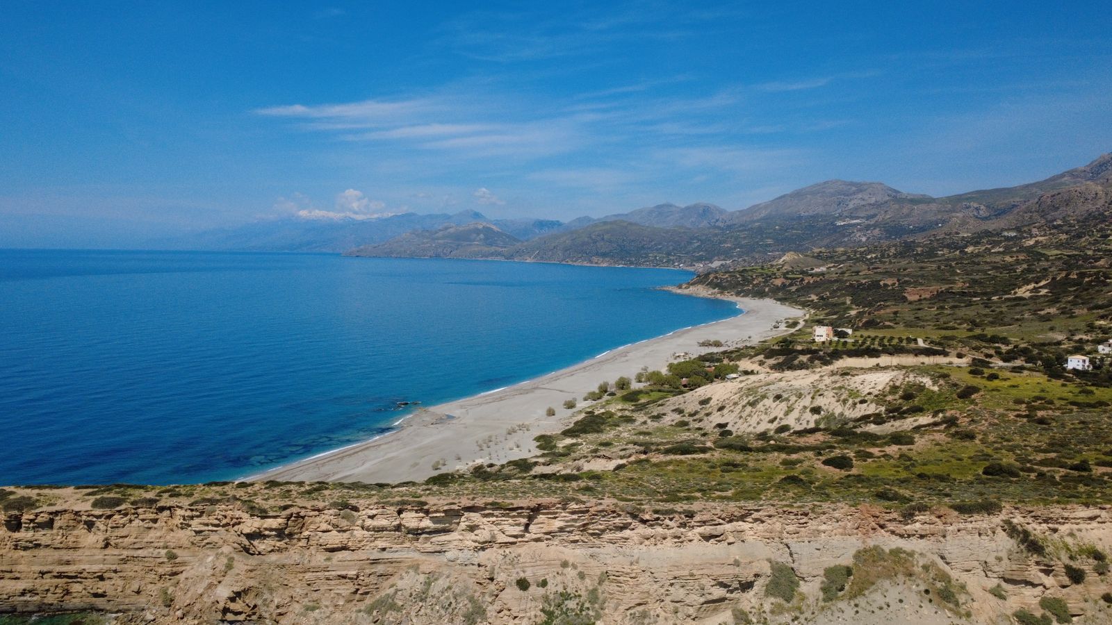 Aerial view of the golden sand and turquoise waters of Triopetra Beach on the south coast of Crete