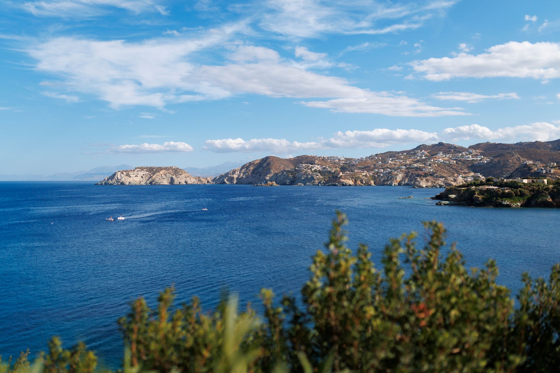 Rocky coastline and clear blue sea along the coast of Crete Greece