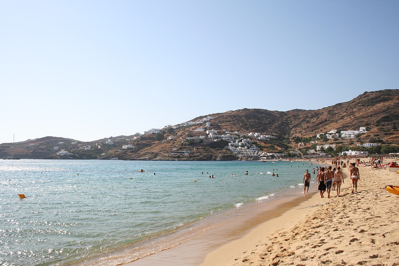 Mylopotas beach on Ios island at ground level with golden sand and clear blue water