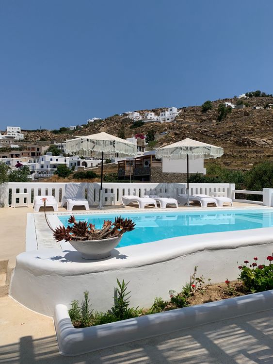 Poolside view overlooking the Aegean Sea on Ios island in the Cyclades